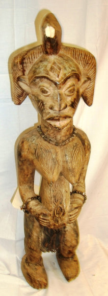 An Old Female Punu Statue